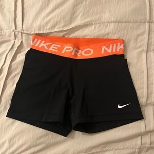 Nike Pro Women's Black and Coral Athletic Shorts like new